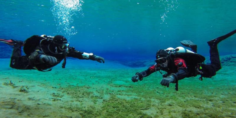 TDI articles written by Richard Devanney outline decompression theory. Two divers at Silfra fissure undertaking a safety stop must obey the rules governing offgassing of nitrogen to minimise their risk of decompression sickness